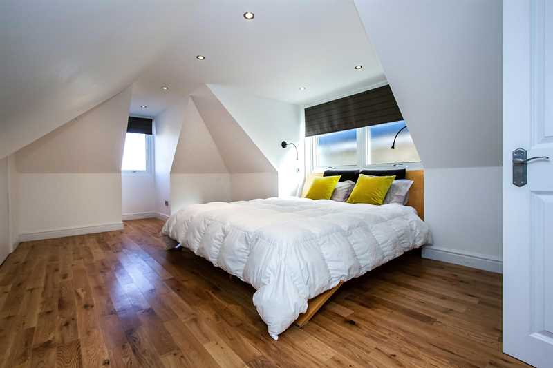 Loft Bedroom with Wooden Floor Northamptonshire Luxury Homes 1